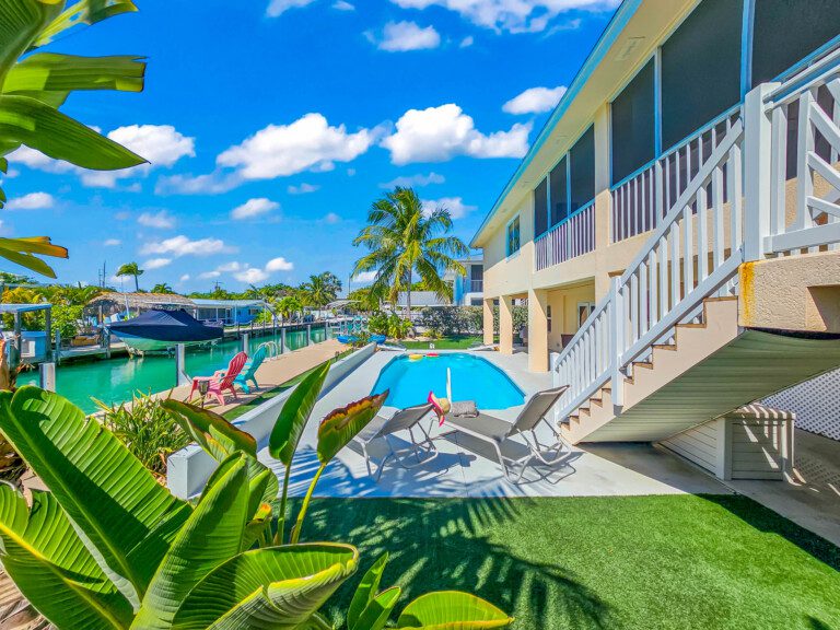 Enjoy a beautiful day by your private pool, relaxing on a lounger with your favorite book in hand.
