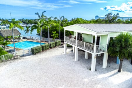 Enjoy a true waterfront retreat surrounded by peaceful views, tropical beauty, and the laid back lifestyle of the Keys.