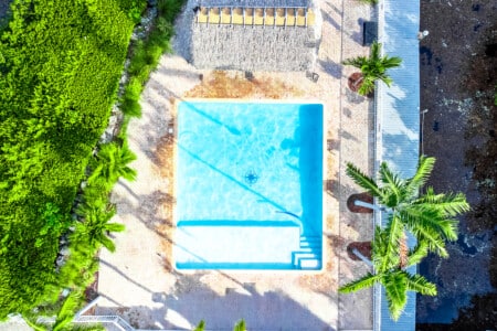 Enjoy a refreshing swim and spend your days relaxing by the pool, surrounded by sunshine, comfort, and vacation vibes.