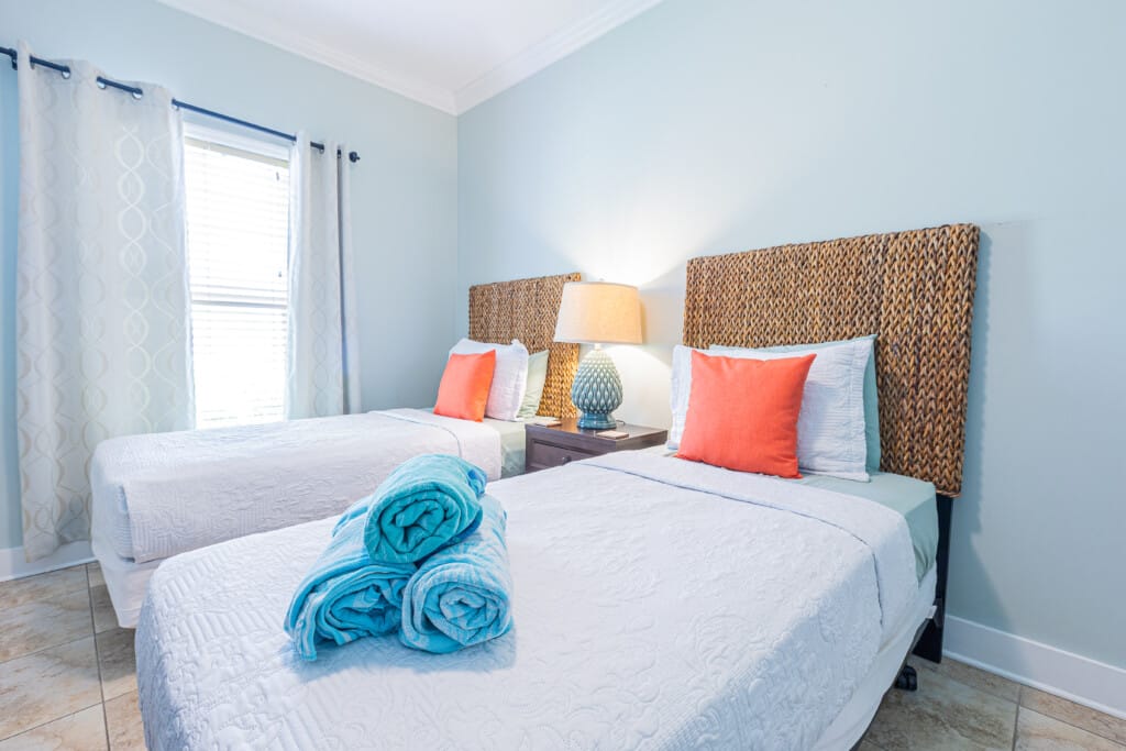 Bedroom 2 - Thoughtfully designed for comfort, this inviting bedroom offers two cozy Twin Beds, a Smart TV, and a spacious closet.