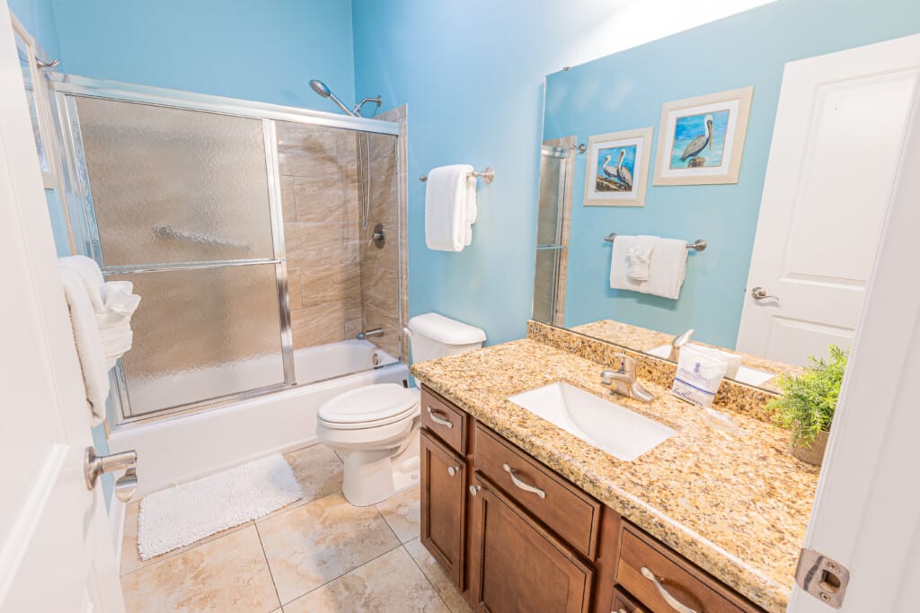 Bathroom 3 - Freshen up after a day of adventures in this inviting bathroom, complete with a beautiful vanity and spacious shower/tub combination.