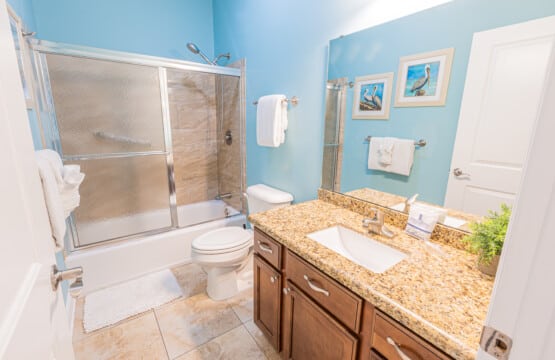 Bathroom 3 - Freshen up after a day of adventures in this inviting bathroom, complete with a beautiful vanity and spacious shower/tub combination.