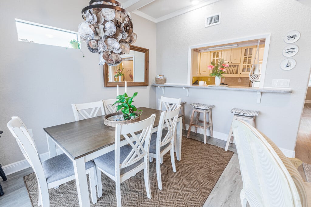 Gather around for a meal surrounded by soft coastal touches and an easygoing island feel.