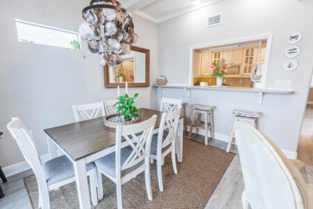 Gather around for a meal surrounded by soft coastal touches and an easygoing island feel.