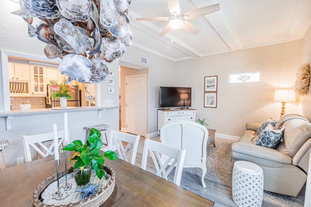 Light and airy living space with comfortable seating, elegant decor, and plenty of natural light.
