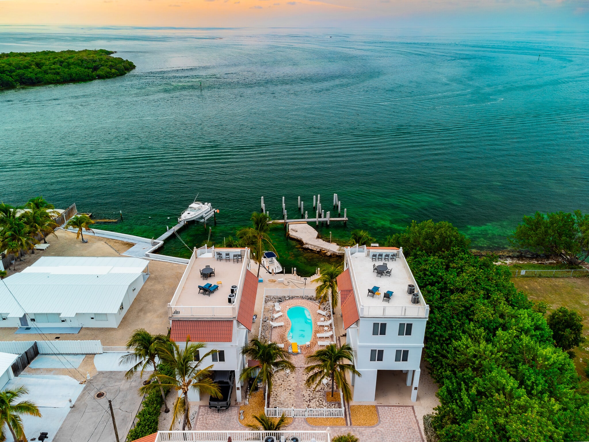 Surrounded by swaying palms and turquoise waters, this is island living at its best.