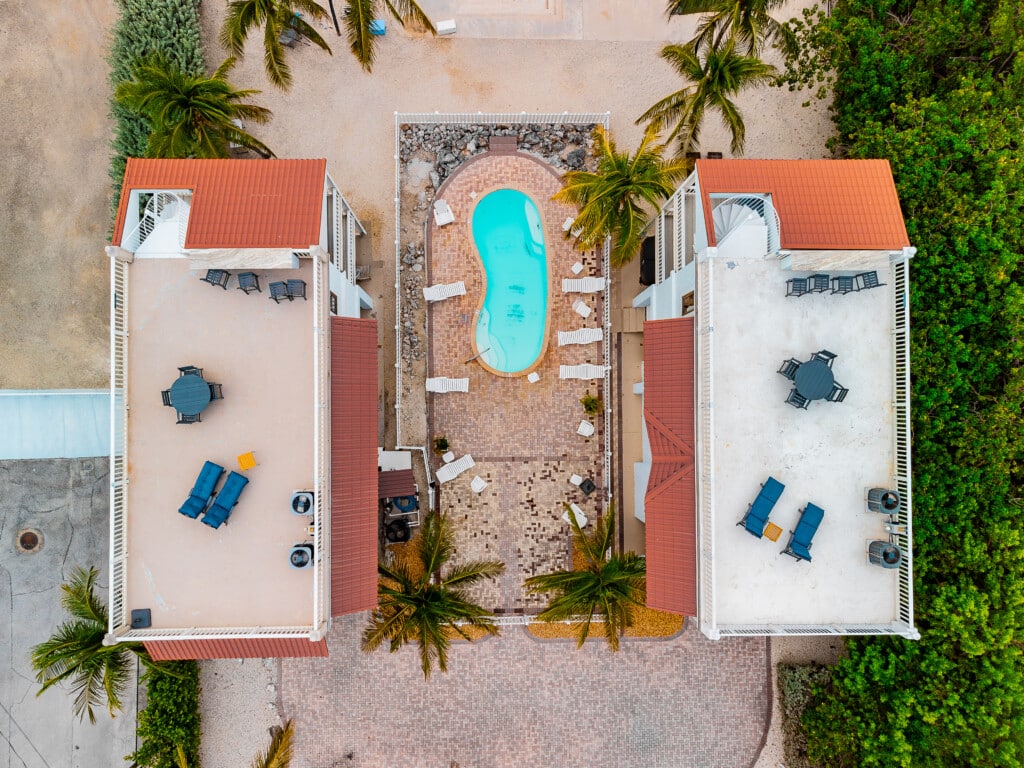 Spend the day by the pool with a refreshing drink and beautiful views all around.