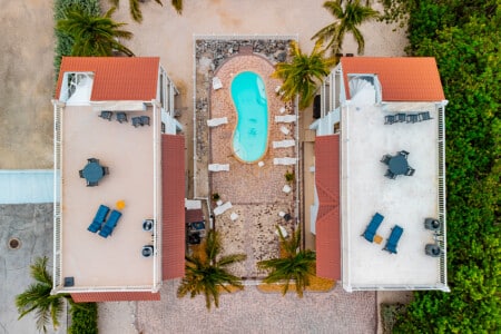 Spend the day by the pool with a refreshing drink and beautiful views all around.