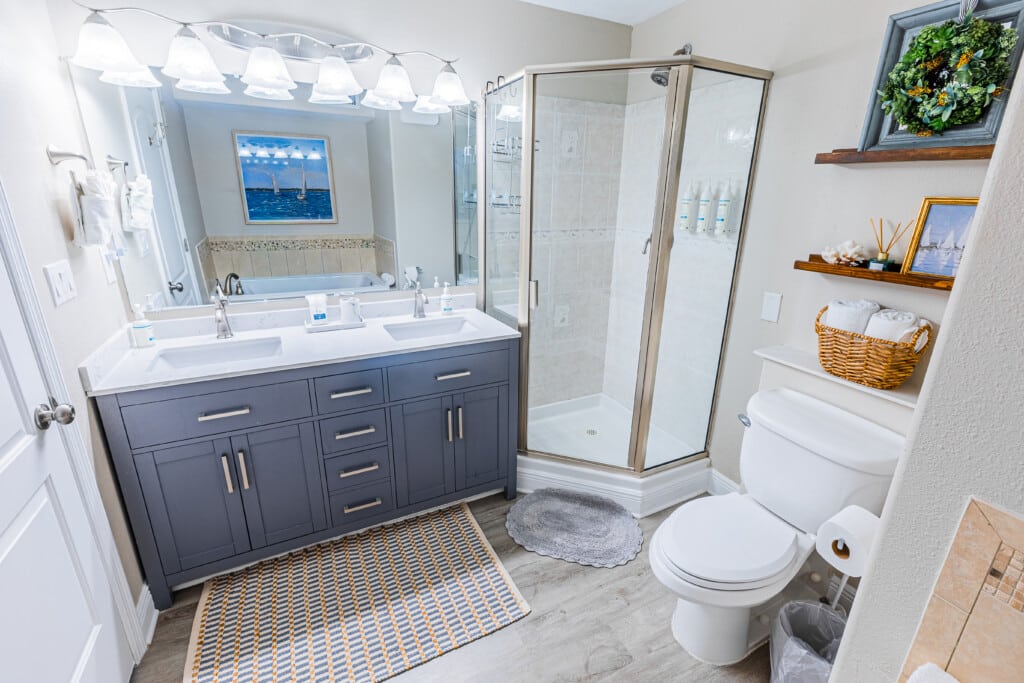 Bathroom 1 - Refresh and recharge in a spacious bathroom featuring a separate shower and tub, plus a double vanity for effortless mornings.