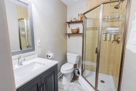 Bathroom 2 - Freshen up in a bright, comfortable En-Suite Bathroom with a spacious shower and vanity, perfect for getting ready for another day in Paradise.