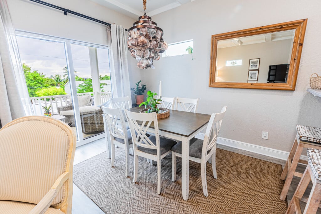 Gather around the dining table with family and friends, sharing delicious meals, good conversation, and memorable vacation moments together.